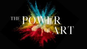 The Power of Art in a white serif font in front of exploding chalk on a black background. It looks very powerful and modern.