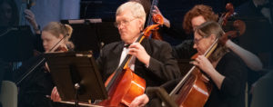 Hastings Symphony Orchestra musicians playing cellos